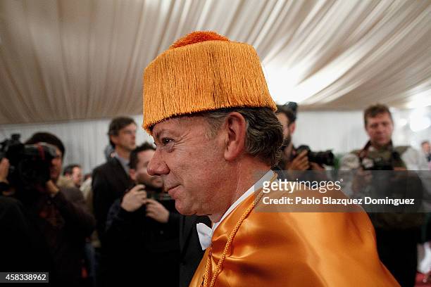 Colombia's President Juan Manuel Santos attends a ceremony where he receives an Honorary Doctorate at the Camilo Jose Cela university on November 3,...