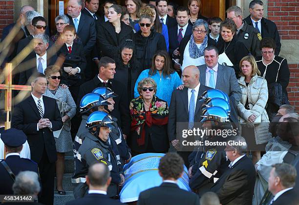Funeral mass was held in Hyde Park for former Boston mayor Thomas M. Menino at the Most Precious Church. Angela Menino and her family behind the...