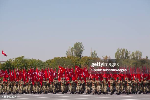 soldiers with flag are at parade in ankara turkey - military parade stock pictures, royalty-free photos & images