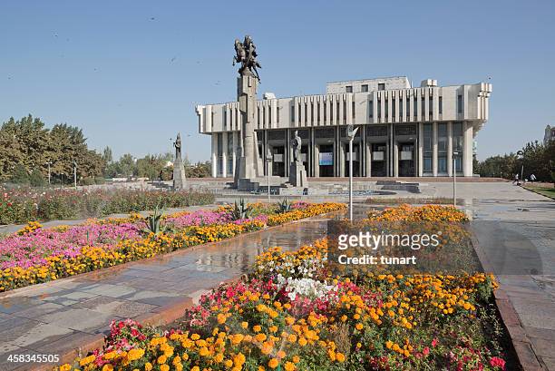 manas statue and philharmonic building, bishkek, kyrgyzstan - bishkek stock pictures, royalty-free photos & images