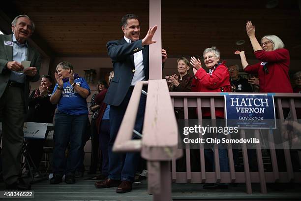 Democratic U.S. Senate candidate Rep. Bruce Braley and Sen. Tom Harkin thank volunteers before they set off to canvass the surrounding neighborhood...