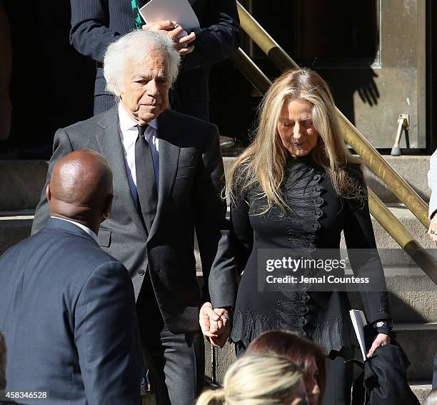 Fashion designer Ralph Lauren and Ricky Lauren depart the funeral of fashion designer Oscar De La Renta at St. Ignatius Of Loyola on November 3, 2014...