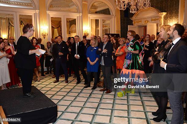 Jo Brand speaks to guests including Grayson Perry at a fundraising event for The Eve Appeal at Claridge's Hotel on November 3, 2014 in London,...