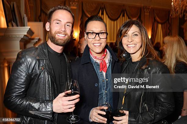 Guest, Gok Wan and Julia Bradbury attend a fundraising event for The Eve Appeal at Claridge's Hotel on November 3, 2014 in London, England.