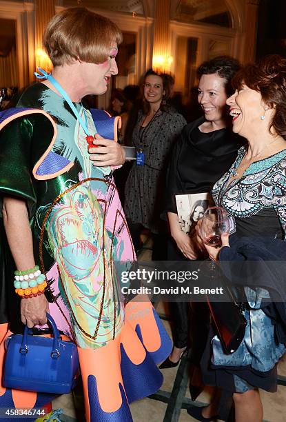 Grayson Perry, Olivia Colman and Kathy Lette attend a fundraising event for The Eve Appeal at Claridge's Hotel on November 3, 2014 in London, England.