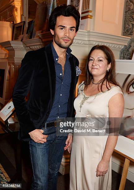 Mark Francis Vandelli and Athena Lamnisos attend a fundraising event for The Eve Appeal at Claridge's Hotel on November 3, 2014 in London, England.