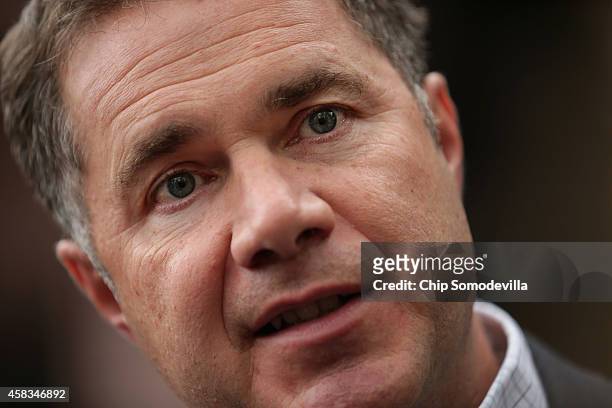 Democratic U.S. Senate candidate Rep. Bruce Braley talks with reporters after thanking volunteers November 3, 2014 in Iowa City, Iowa. According to...