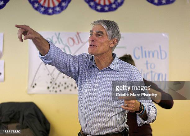 Sen. Mark Udall thanks volunteers at a Democratic field office on November 3, 2014 in Aurora, Colorado. Udall is facing off against Republican...