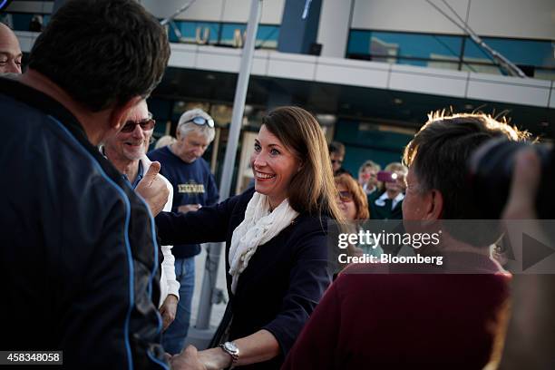 Alison Lundergan Grimes, Democratic candidate for the U.S. Senate, greets supporters at a campaign rally in Newport, Kentucky, U.S., on Monday, Nov....