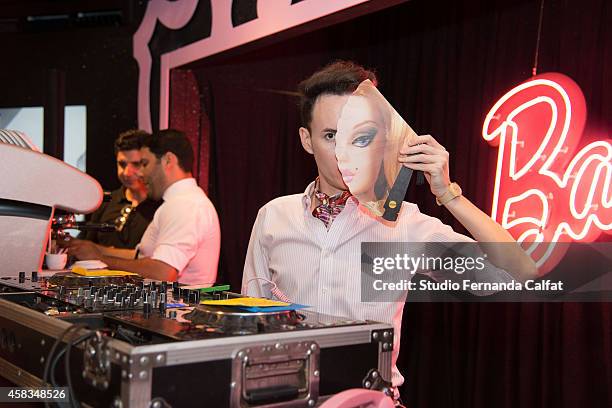 Johnny Luxo provides music at the Barbie Experience during Sao Paulo Fashion Week Winter 2015 at Porao das Artes on November 3, 2014 in Sao Paulo,...