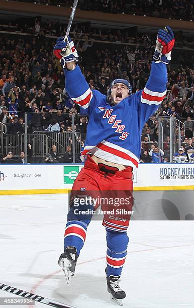 Chris Kreider of the New York Rangers reacts after scoring a goal in the first period against the St. Louis Blues at Madison Square Garden on...