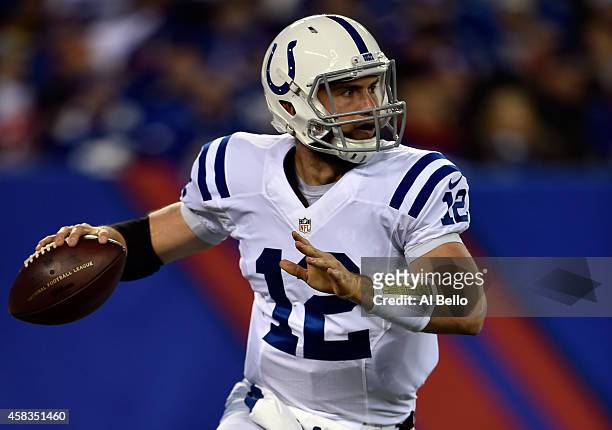 Andrew Luck of the Indianapolis Colts looks to throw a pass in the in the first quarter against the New York Giants during their game at MetLife...