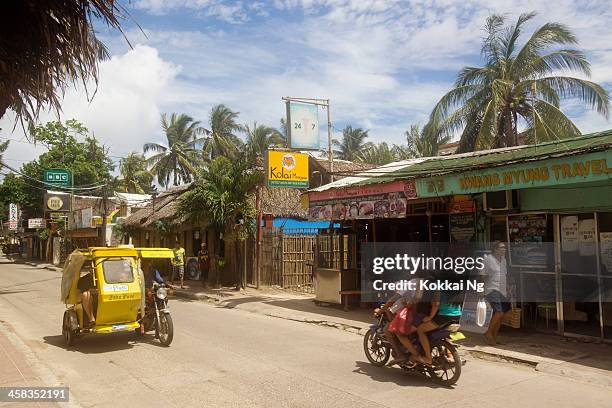 streets of boracay - filipino tricycle stock pictures, royalty-free photos & images
