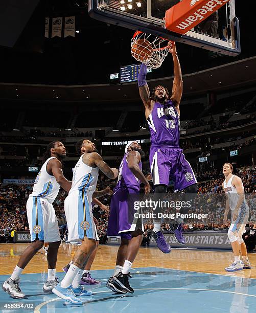 Derrick Williams of the Sacramento Kings dunks the ball against the Denver Nuggets at Pepsi Center on November 3, 2014 in Denver, Colorado. NOTE TO...