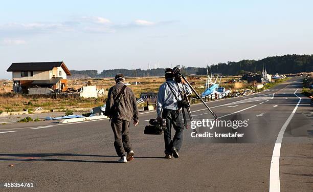tv-crew in fukushima - 2011 tohoku earthquake and tsunami stock pictures, royalty-free photos & images