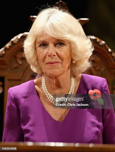 Camilla, Duchess of Cornwall signs the visitor's book in front of a Diego Rivera mural at the launch of 'The Year of the UK in MExico 2015' at San...