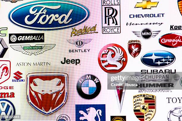 collection of car manufacturer logos on computer screen - fiat logo stock pictures, royalty-free photos & images