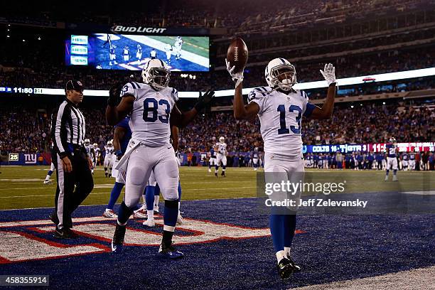 Hilton of the Indianapolis Colts celebrates with Dwayne Allen after catching 30 yard touchdown pass thrown by Andrew Luck in the third quarter...
