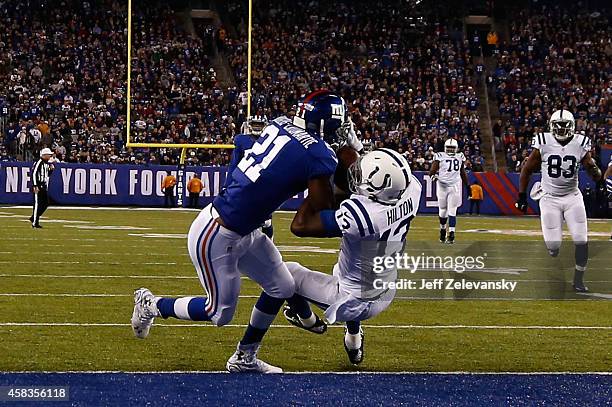 Hilton of the Indianapolis Colts catches a 30 yard touchdown pass thrown by Andrew Luck in the third quarter against the New York Giants during their...