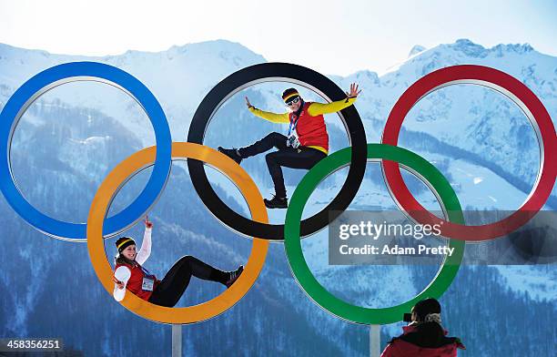 Sandra Kiriasis and Franziska Fritz of Germany pose for a picture with the Olympic Rings at Athletes Village ahead of the Sochi 2014 Winter Olympics...