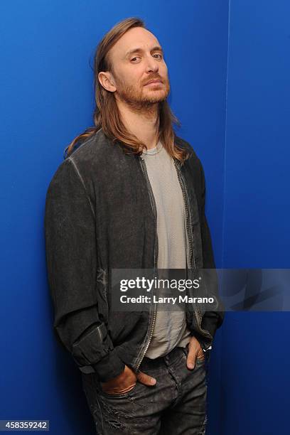 David Guetta poses for a portrait at Y 100 radio Station on November 3, 2014 in Miami, Florida.