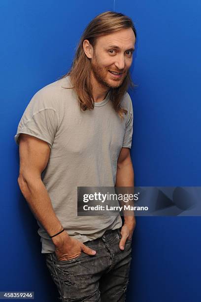 David Guetta poses for a portrait at Y 100 radio Station on November 3, 2014 in Miami, Florida.