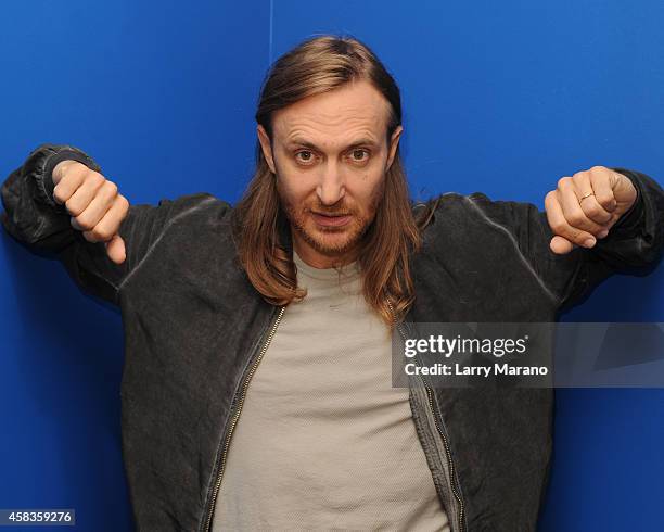 David Guetta poses for a portrait at Y 100 radio Station on November 3, 2014 in Miami, Florida.