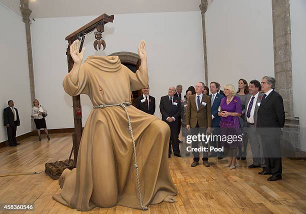Camilla, Duchess of Cornwall looks at the work of artist Michael Landy at the launch of 'The Year of the UK in Mexico 2015' at San Ildefonso College...