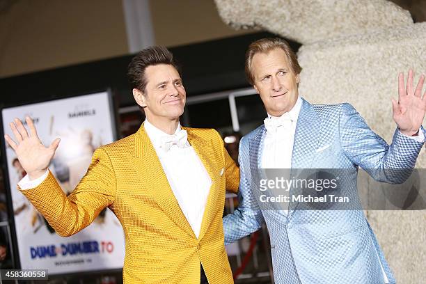 Jim Carrey and Jeff Daniels arrive at the Los Angeles premiere of "Dumb And Dumber To" held at Regency Village Theatre on November 3, 2014 in...