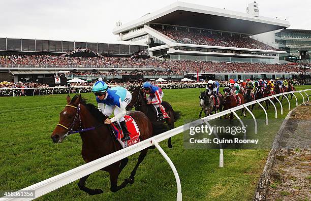 Zac Purton riding Admire Rakti goes around the bend on the first lap of the Emirates Melbourne Cup on Melbourne Cup Day at Flemington Racecourse on...