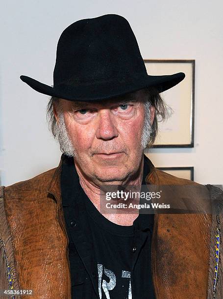 Musician Neil Young attends his opening night reception for "Special Deluxe" Art Exhibition at Robert Berman Gallery on November 3, 2014 in Santa...