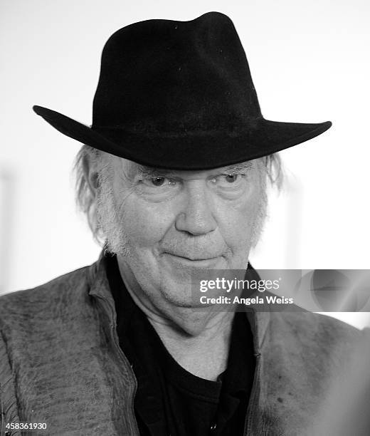 Musician Neil Young attends his opening night reception for "Special Deluxe" Art Exhibition at Robert Berman Gallery on November 3, 2014 in Santa...