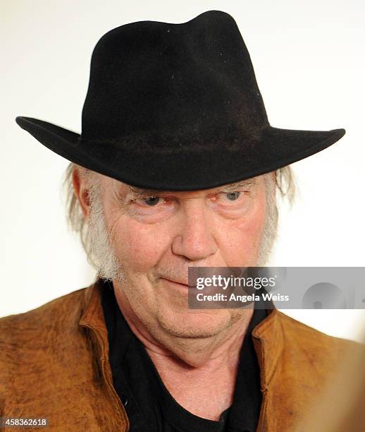 Musician Neil Young attends his opening night reception for "Special Deluxe" Art Exhibition at Robert Berman Gallery on November 3, 2014 in Santa...