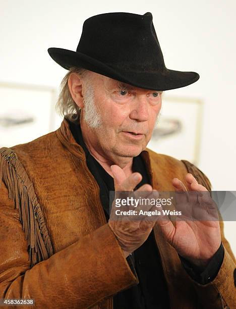 Musician Neil Young attends his opening night reception for "Special Deluxe" Art Exhibition at Robert Berman Gallery on November 3, 2014 in Santa...