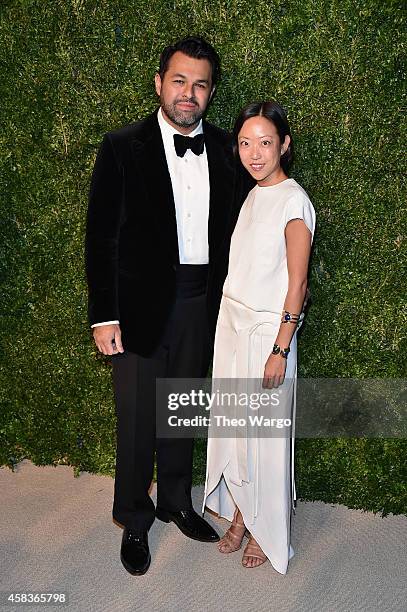 Designer Juan Carlos Obando and a guest attend the 11th annual CFDA/Vogue Fashion Fund Awards at Spring Studios on November 3, 2014 in New York City.