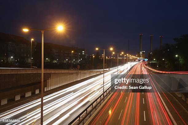 Cars and traffic fill the A100 ring highway at dusk on November 3, 2014 in Berlin, Germany. Germany is heatedly debating the introduction of highway...