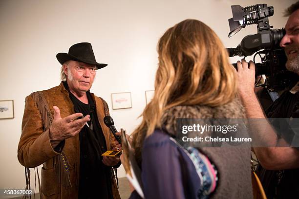 Musician / artist Neil Young attends his opening night reception for "Special Deluxe" at Robert Berman Gallery on November 3, 2014 in Santa Monica,...