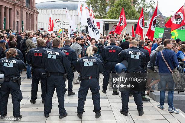 protests against npd election campaign - ss nazi party stock pictures, royalty-free photos & images