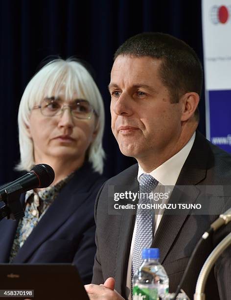 David Osborn , director of the International Atomic Energy Agency Environment Laboratories, speaks to the press in Tokyo on November 4, 2014 while...