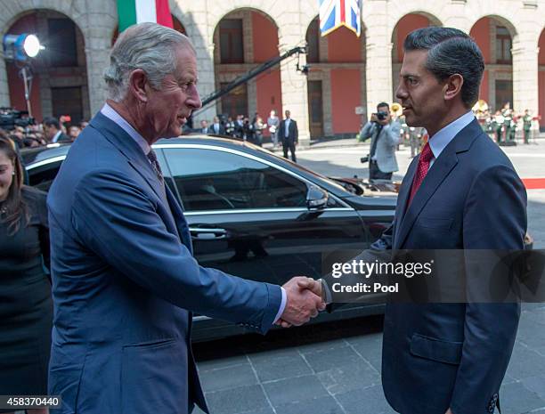 Prince Charles, Prince of Wales is welcomed by Mexican President Enrique Pena Nieto at the Palacio National on November 3, 2014 in Mexico City,...