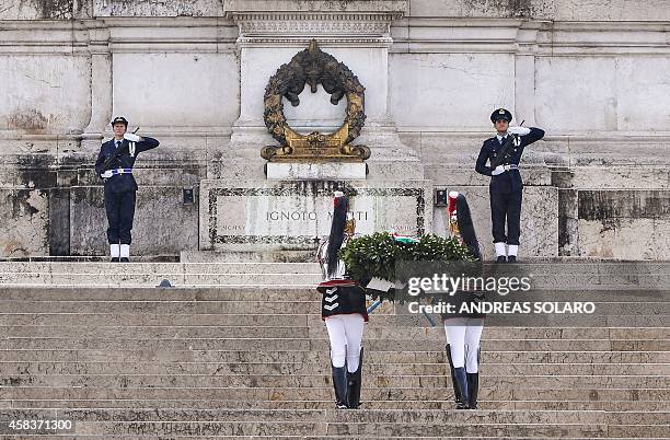 Italian corazzieri, members of the Italian Presidential Republic Honour Guard lay a laurel wreath at the Altare della Patria during Italy's National...