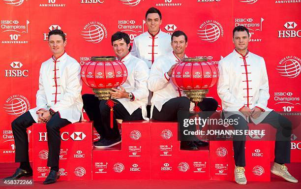 Golfers Justin Rose of England, Bubba Watson of the US, Rickie Fowler of the US, Adam Scott of Australia and Martin Kaymer of Germany wear Chinese...