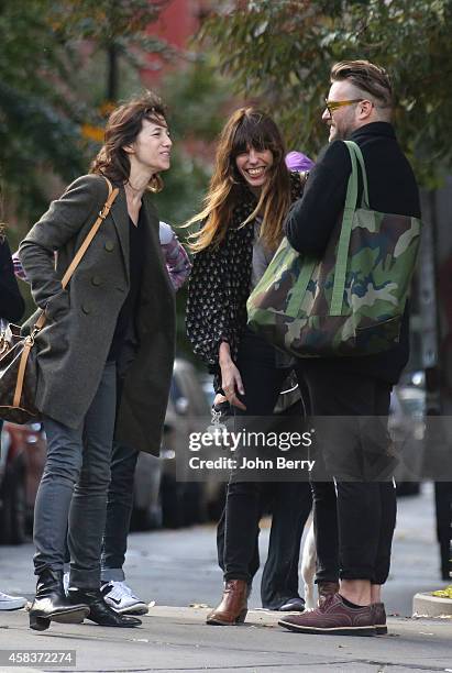 Charlotte Gainsbourg, Lou Doillon and a friend are seen strolling around Greenwich Village in Manhattan on October 30, 2014 in New York City.