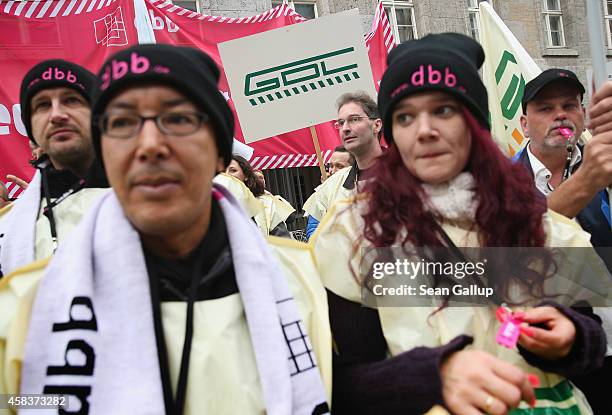 Members of the GDL train drivers' labour union protest for the rights of smaller unions outside a congress of the German Federation of Employers on...