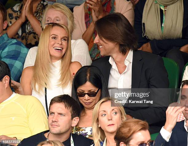 Amanda Holden and Chris Hughes attend day six of the Wimbledon Tennis Championships at Wimbledon on July 02, 2016 in London, England.