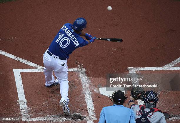 Edwin Encarnacion of the Toronto Blue Jays hits a three-run home run in the first inning during MLB game action against the Cleveland Indians on July...