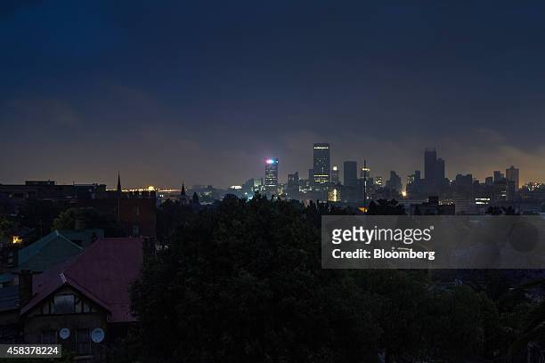 Darkness surrounds residential homes due to a load shedding blackout by Eskom Holdings SOC Ltd. In the Troyeville suburb of Johannesburg, South...