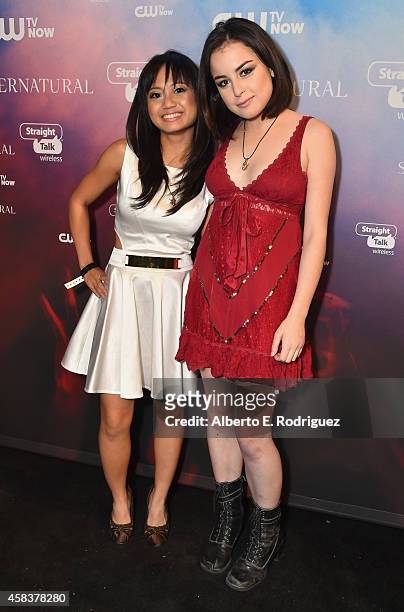 Actors Joy Regullano and Katie Sarife attend the CW's Fan Party to Celebrate the 200th episode of "Supernatural" on November 3, 2014 in Los Angeles,...