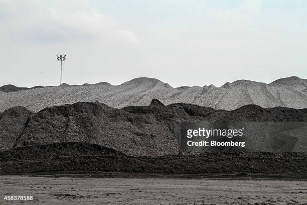 Coal stores for fuel sit in the coal yard at the Grootvlei power station, operated by Eskom Holdings SOC Ltd., in Grootvlei, South Africa, on Monday,...