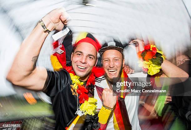 Supporters of the German national soccer team poses during the UEFA EURO 2016 match between Germany and Italy at the public viewing area in the...